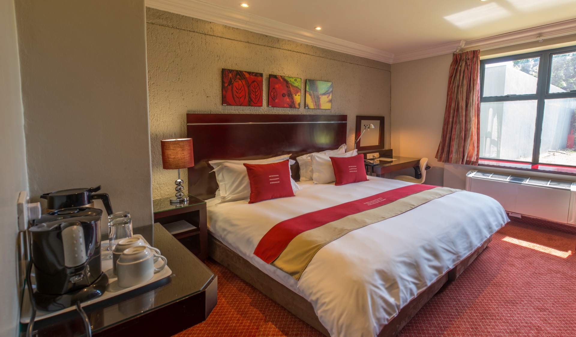 Executive King room at Metcourt Inn, Gaborone with coffee station and bright window