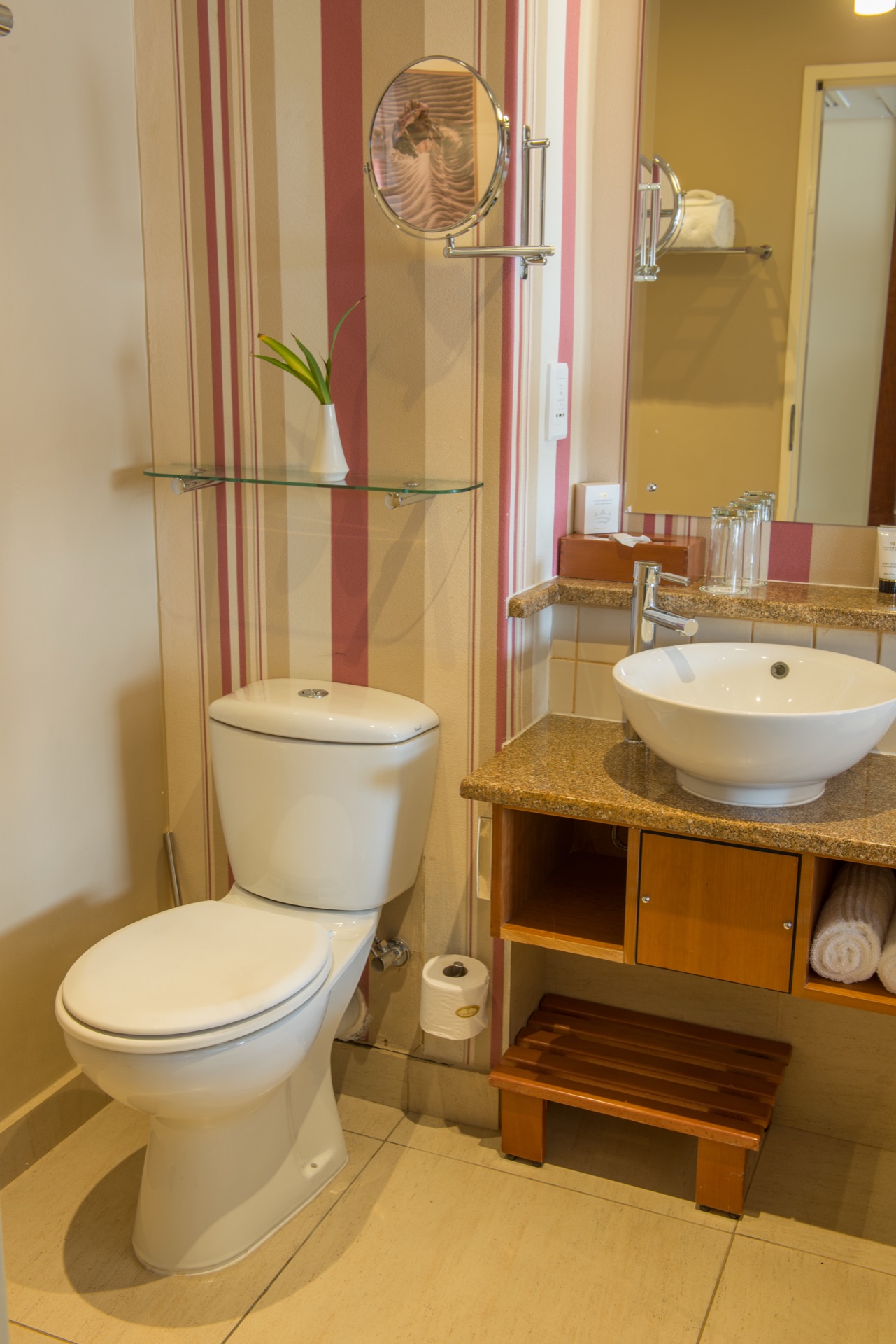 Classic room bathroom with vessel basin, granite vanity and toilet at the Walmont, The Grand Palm, Gaborone