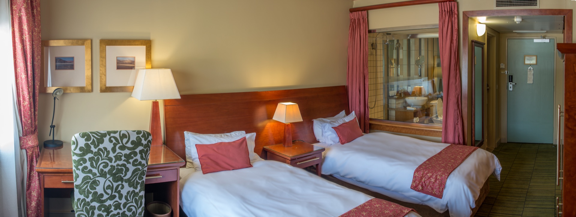 Classic Twin room with twin beds and internal bathroom window at the Walmont, The Grand Palm, Gaborone